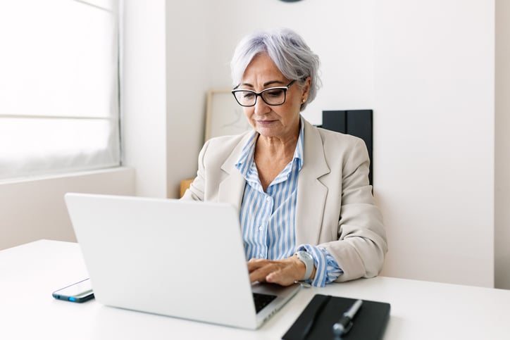 HR-Senior-women-at-desk-GettyImages-1818723428
