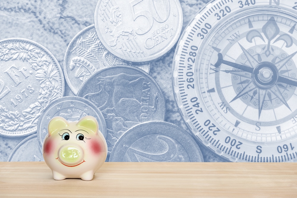 piggy bank with currency graphic