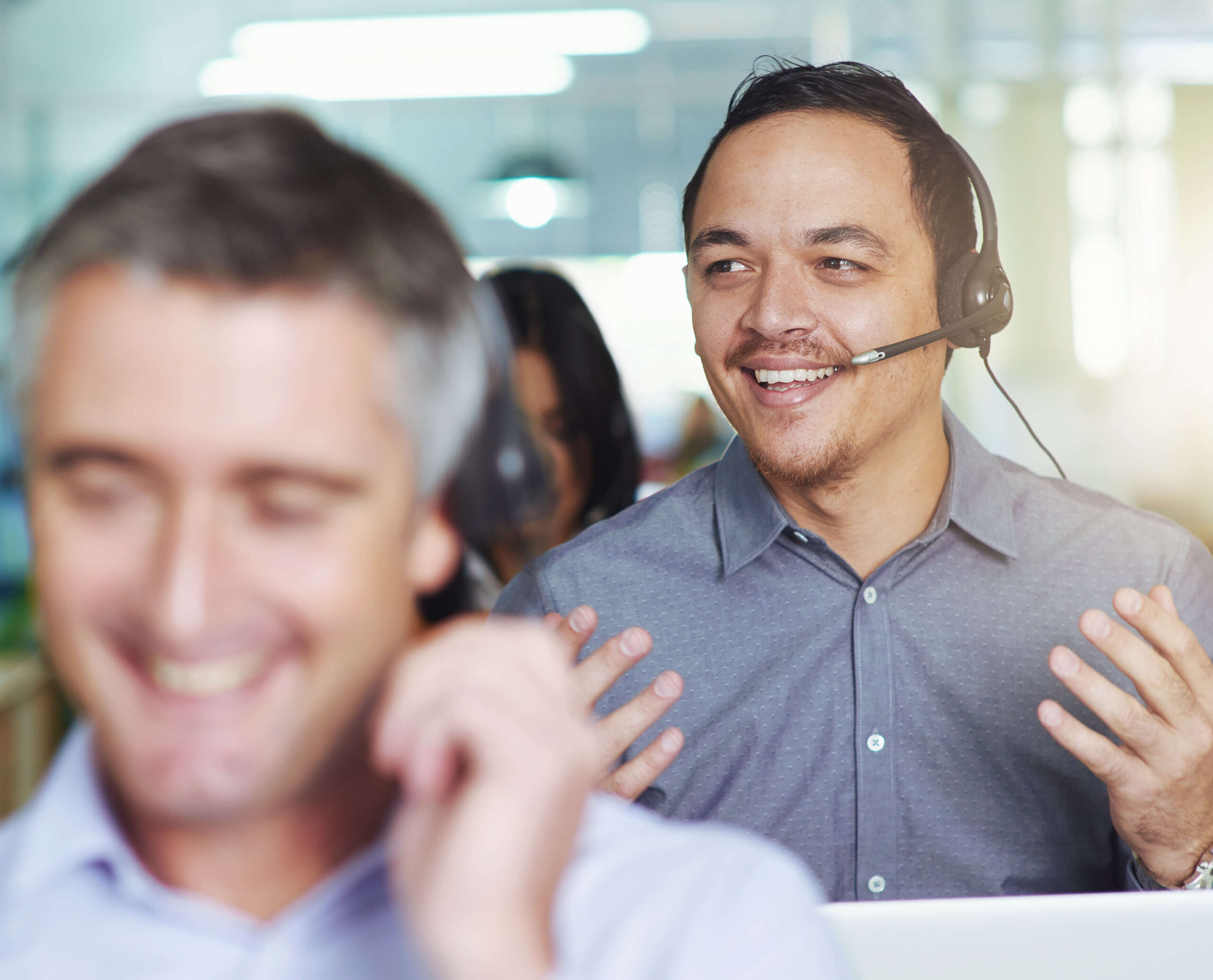 people working with office headphones