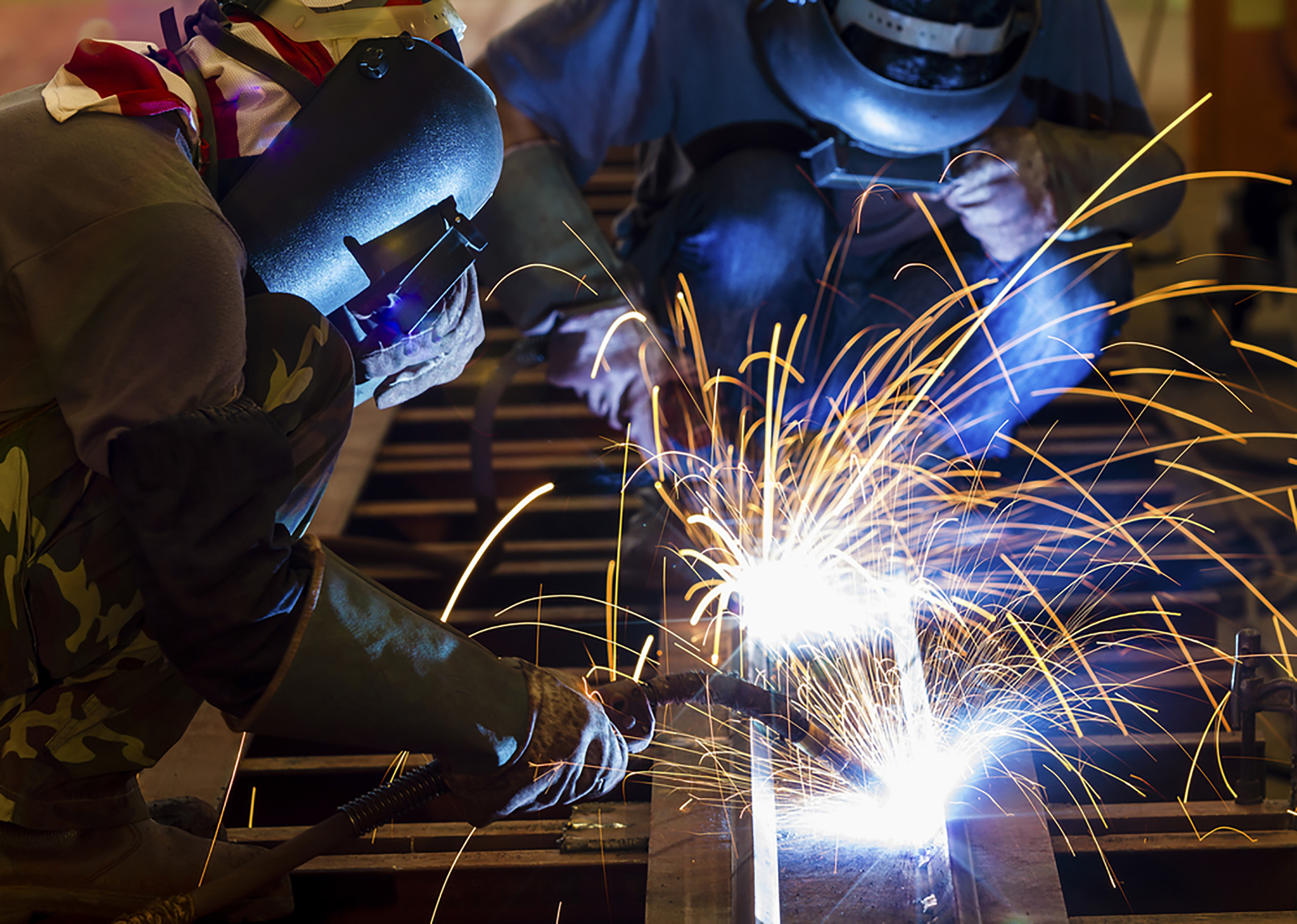 welders with sparks