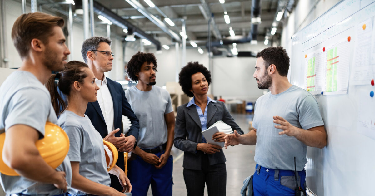 workers listening to presentation