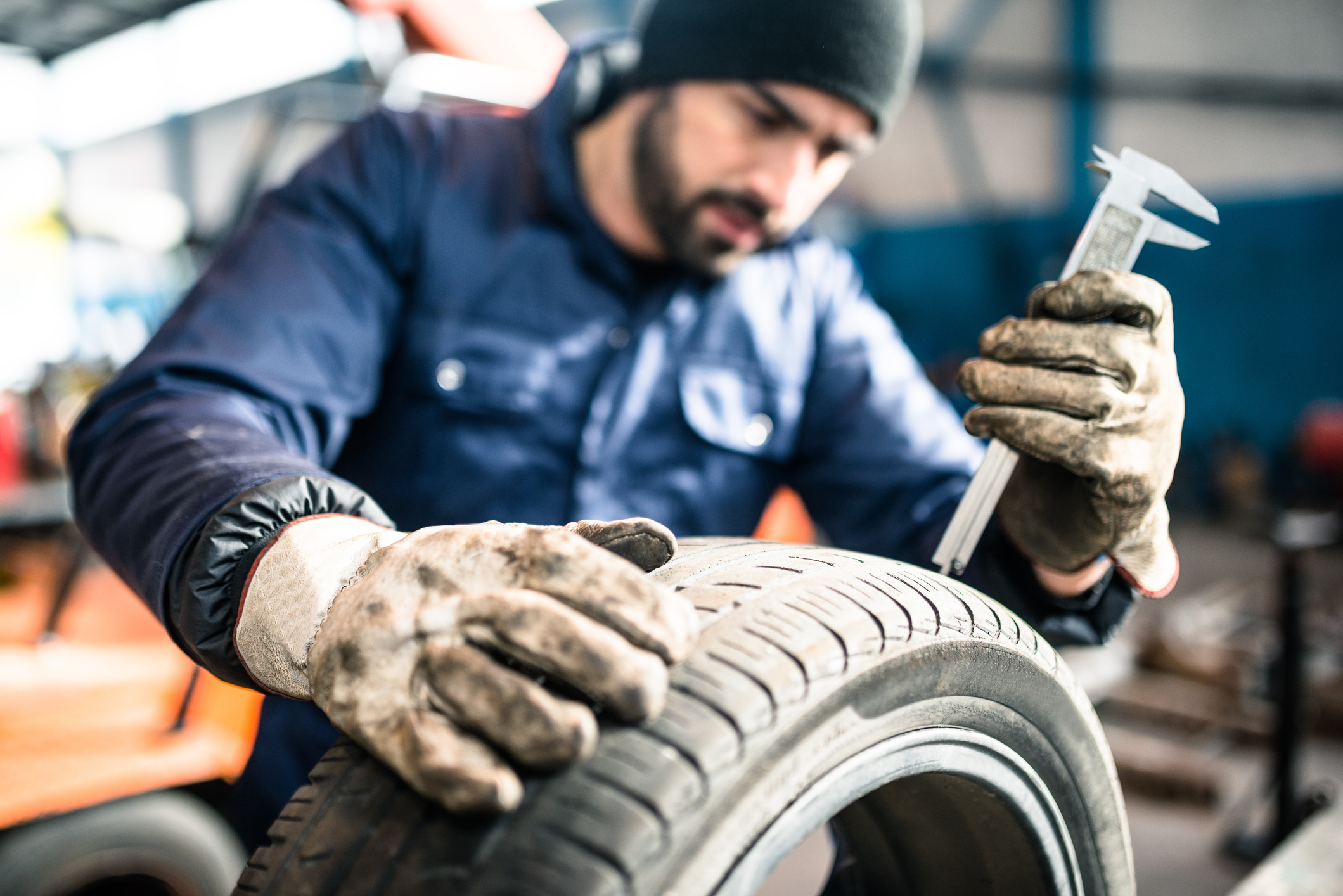 tire repairer checking the tire integrity